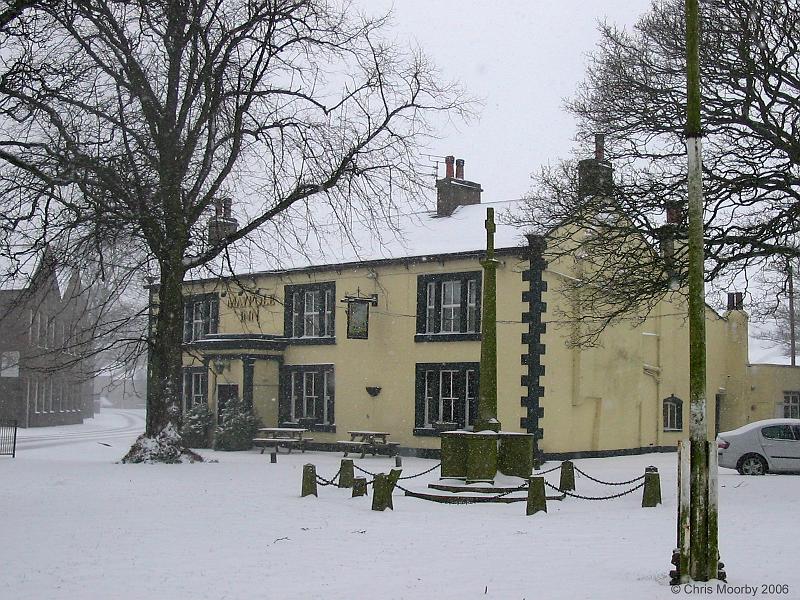 Maypole in snow.jpg - "The Maypole Inn"  - by Chris Moorby Snow on the Maypole Inn and Village Green at Long Preston.